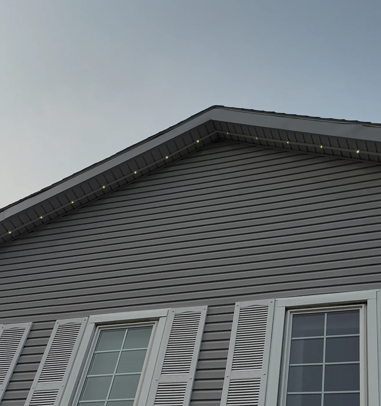 Govee track kit installed on a home's roofline