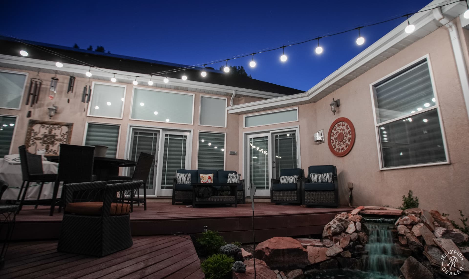 Warm bistro globes over the deck