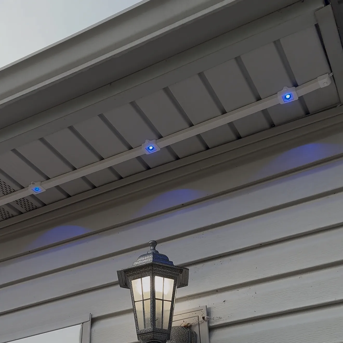 Govee track kit installed on a home's roofline