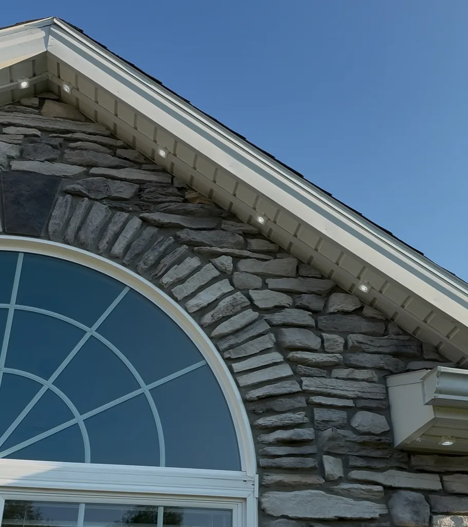 Govee track kit installed on a home's roofline