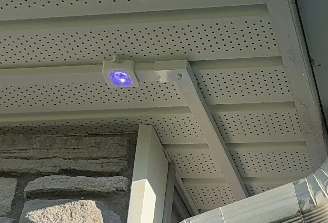 Govee track kit installed on a home's roofline