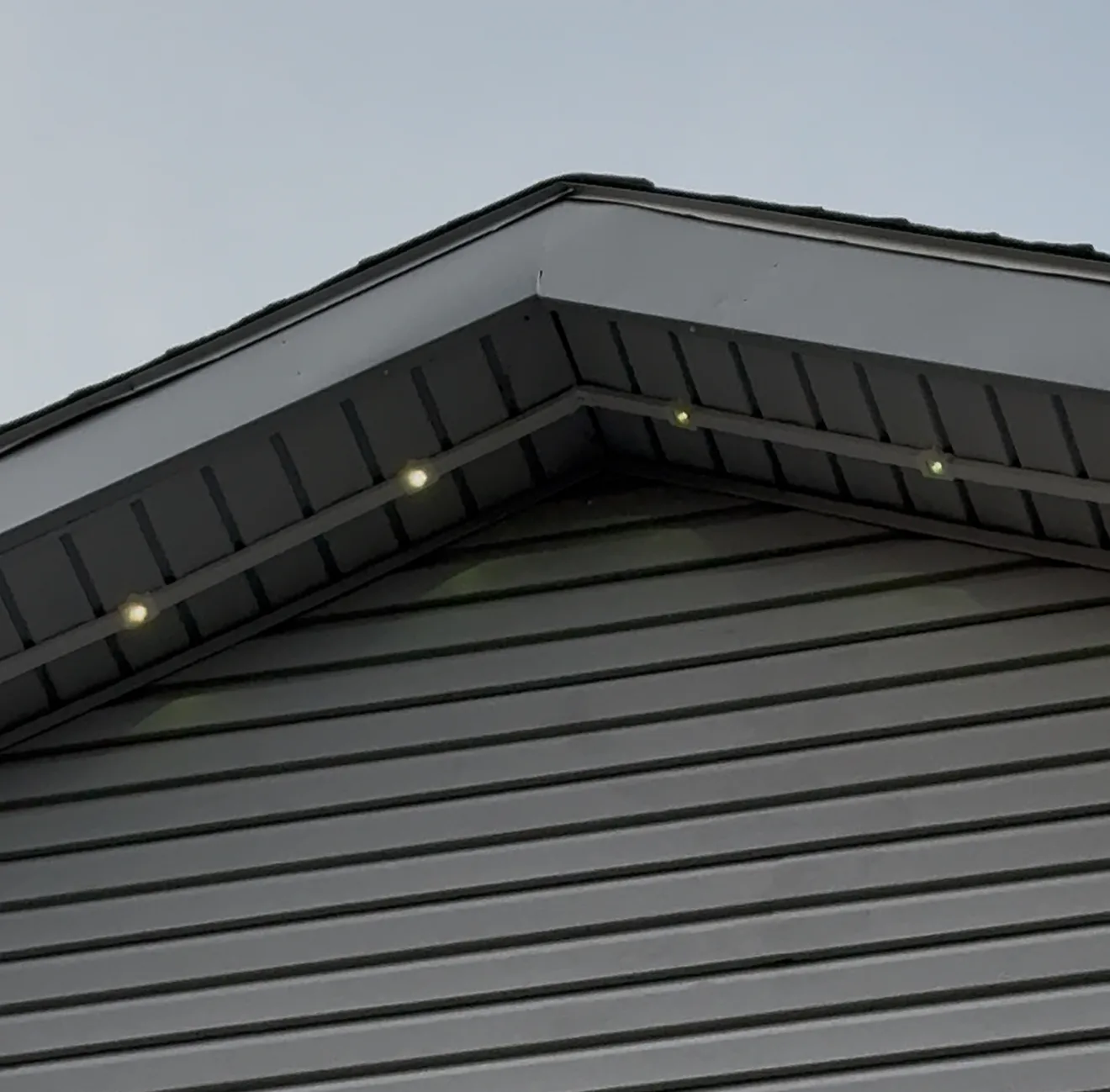 Govee track kit installed on a home's roofline